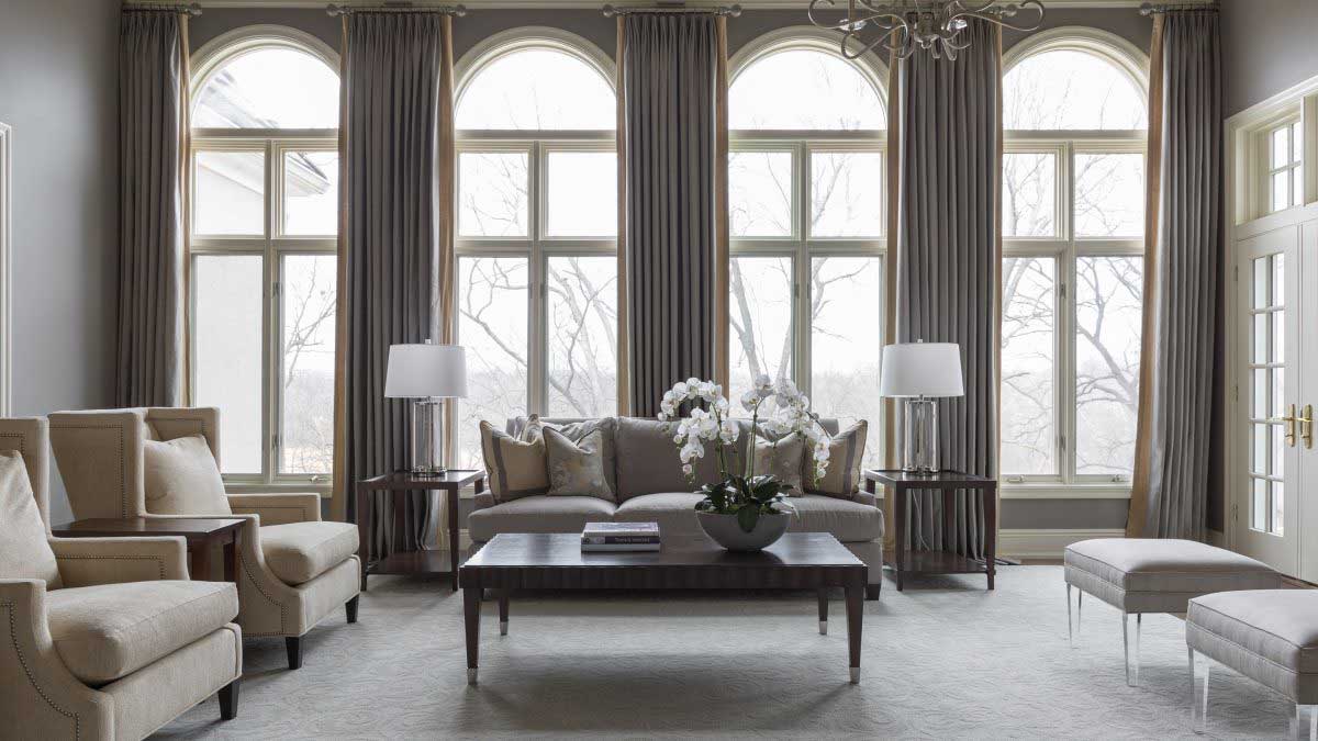 large picture windows with beautiful draperies